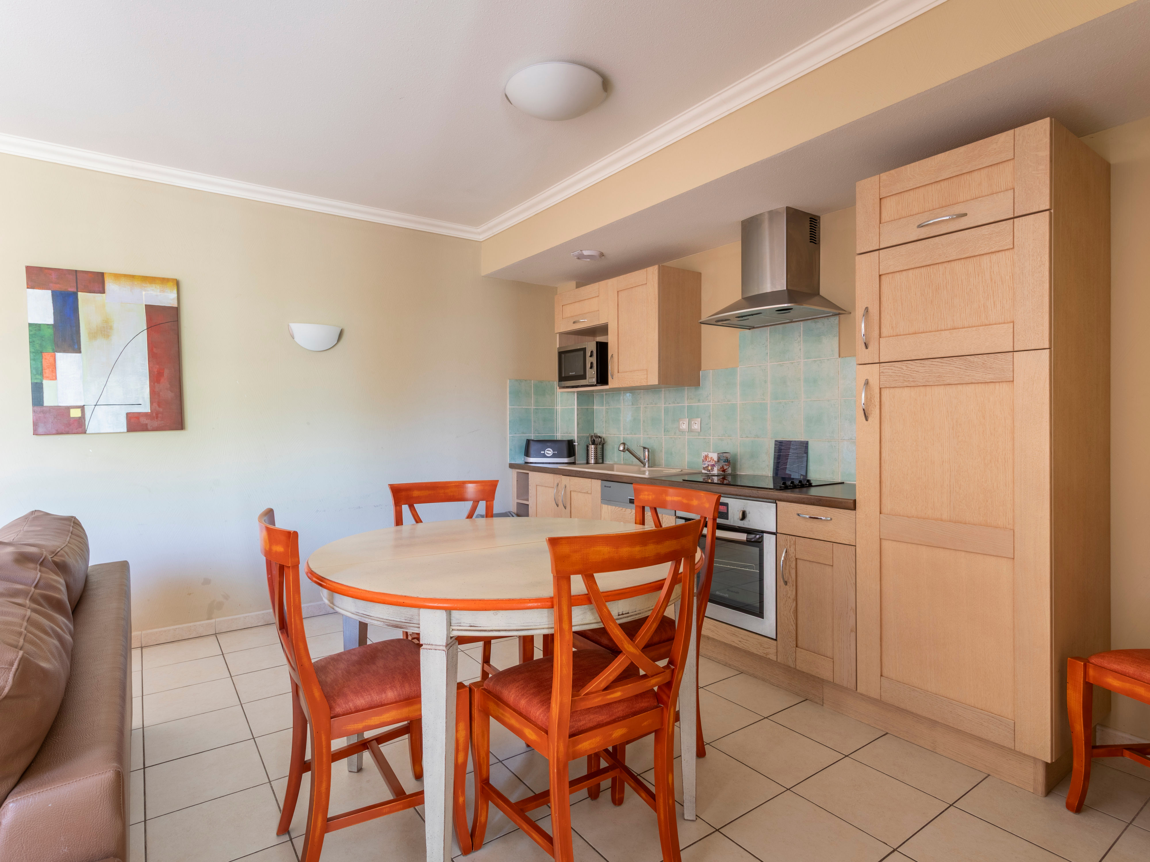 image Dining area with table seating for the group, just off the kitchen and living space