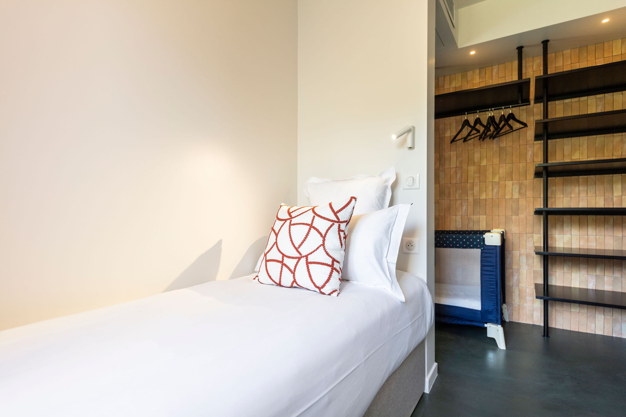 image One of the flexible single beds with open-shelf storage — configures as a double when joined