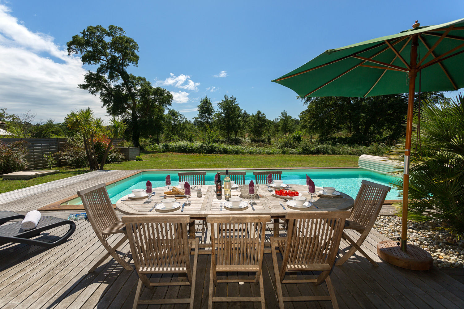 image Outdoor table and chairs on the terrace — the garden is large enough to let everyone spread out.