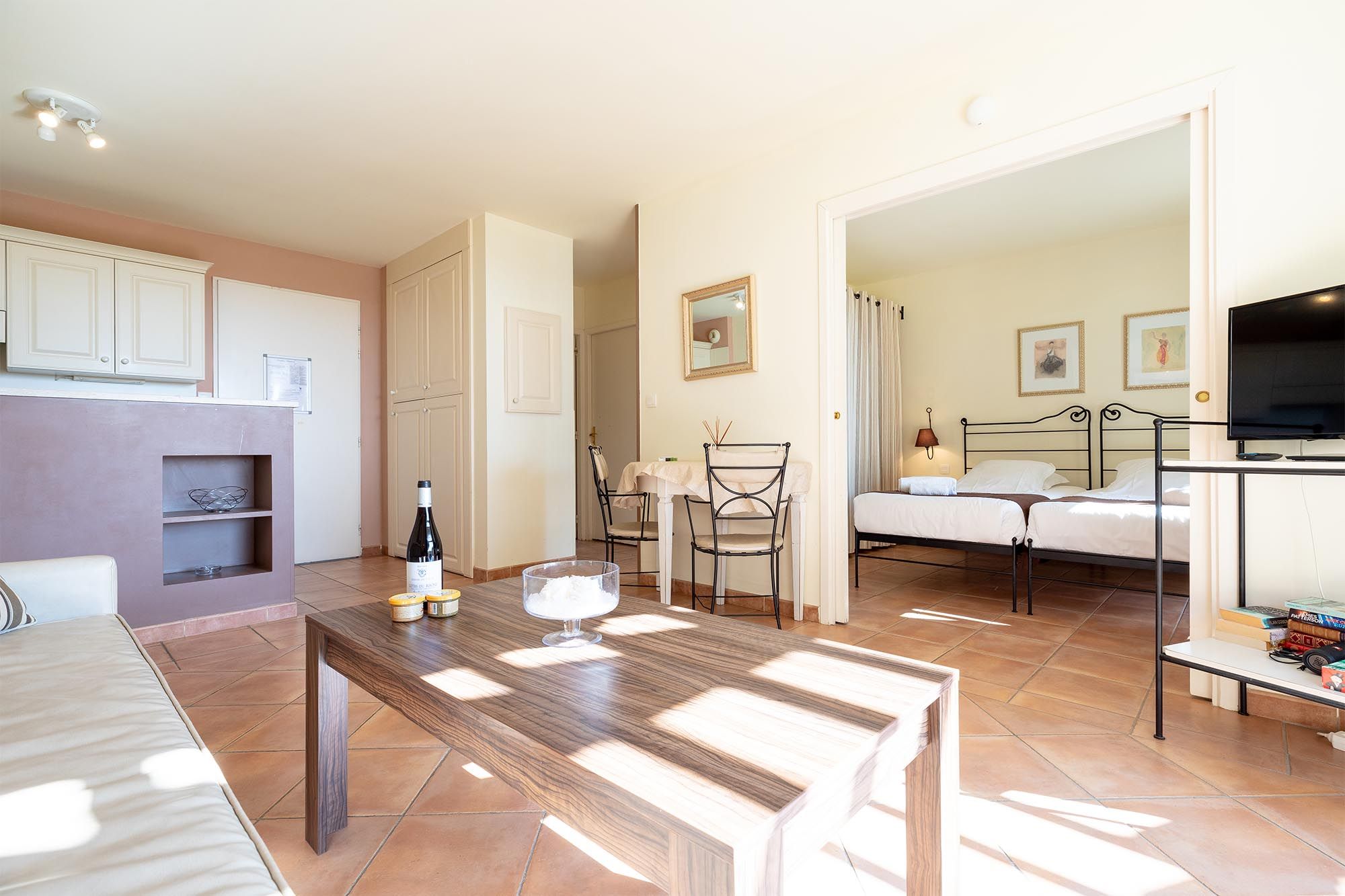 image A bright, airy living space with a fully-equipped kitchen, ideal for relaxed evenings in Provence.