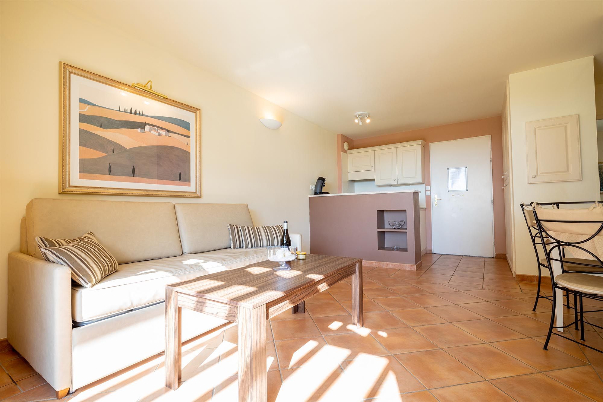 image Generous living space bathed in natural light, with everything you need for a comfortable self-catering stay.