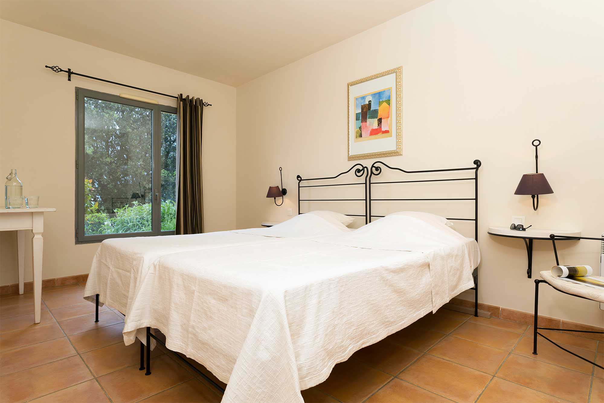 image Rest and recharge in a comfortable, individually decorated bedroom — all linen included for your stay.