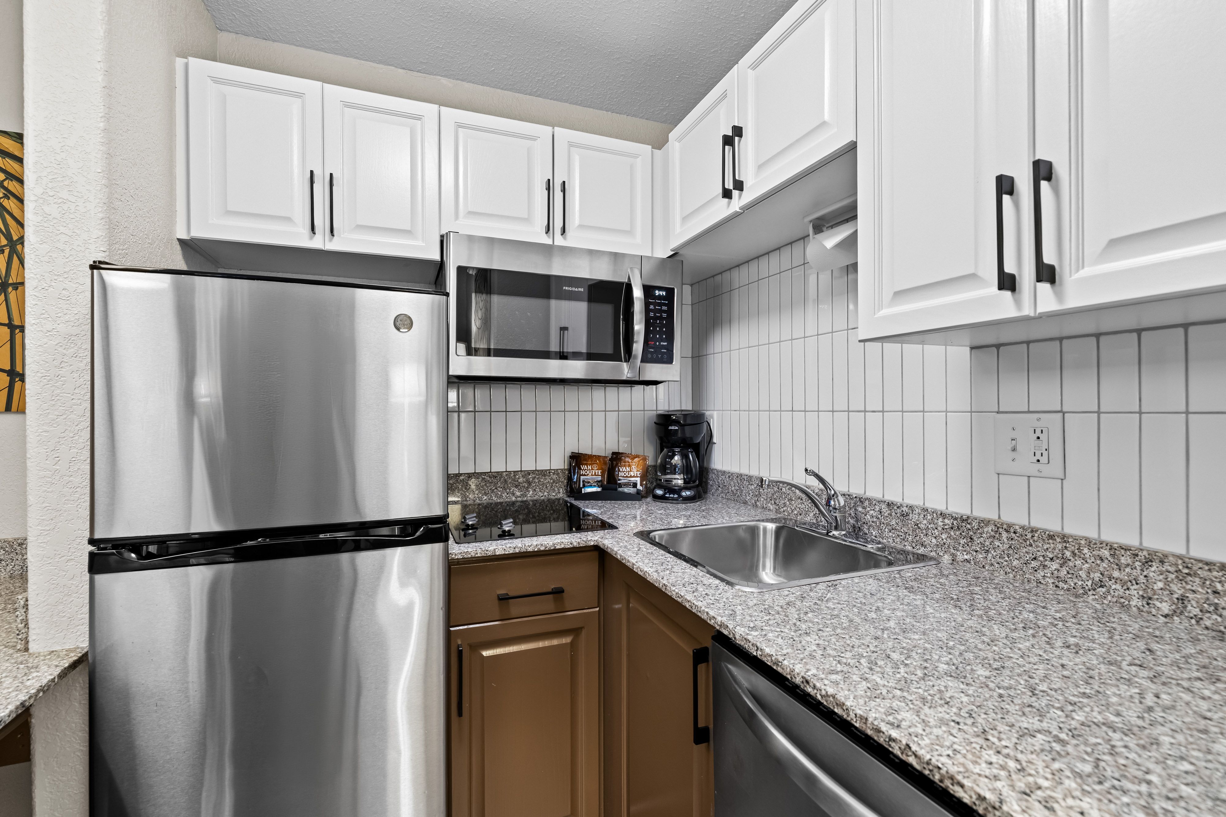 image Well-equipped kitchen with modern appliances.