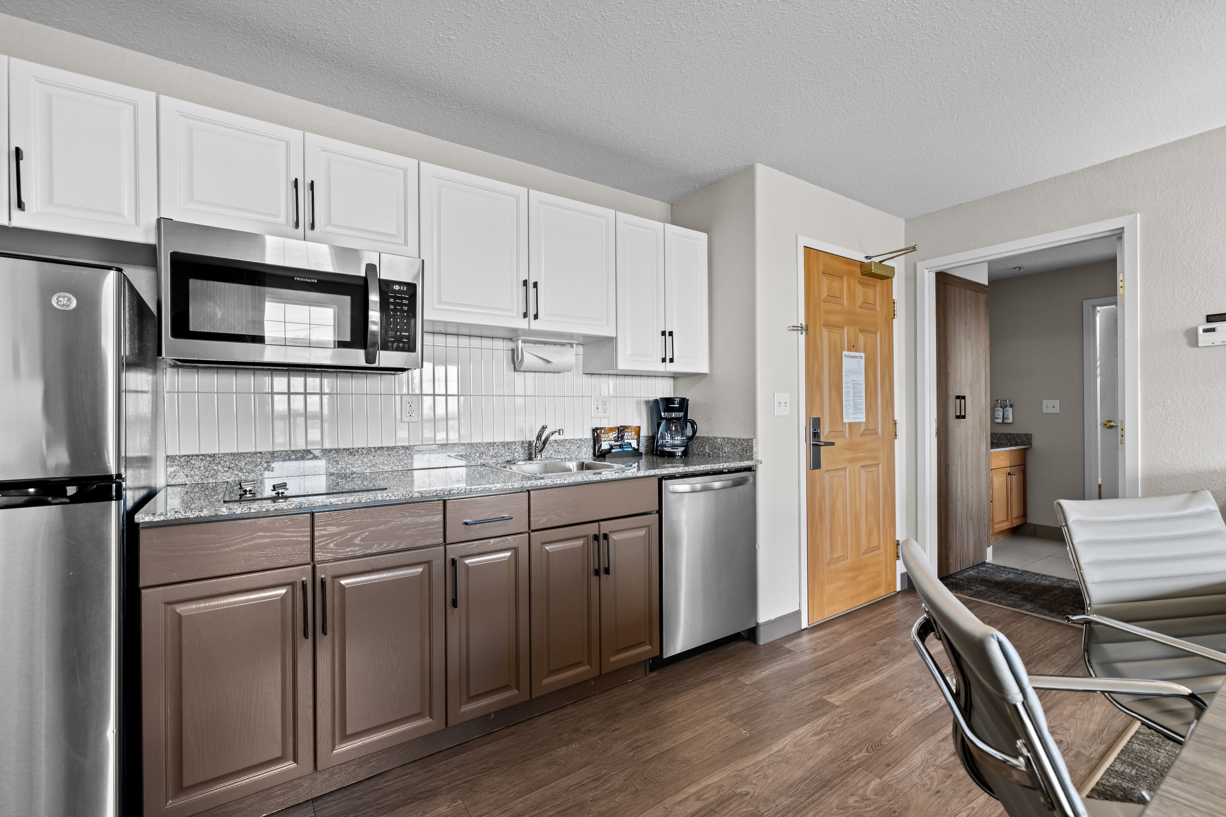 image Kitchen with stainless steel appliances and cabinetry.