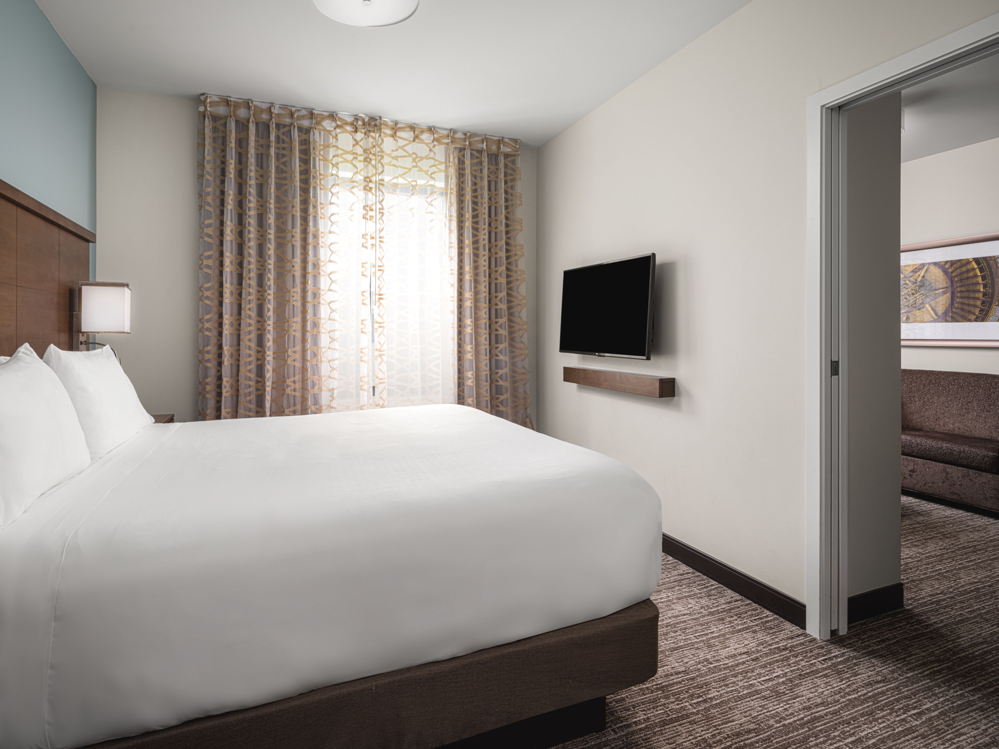 image Bedroom with king bed and TV.