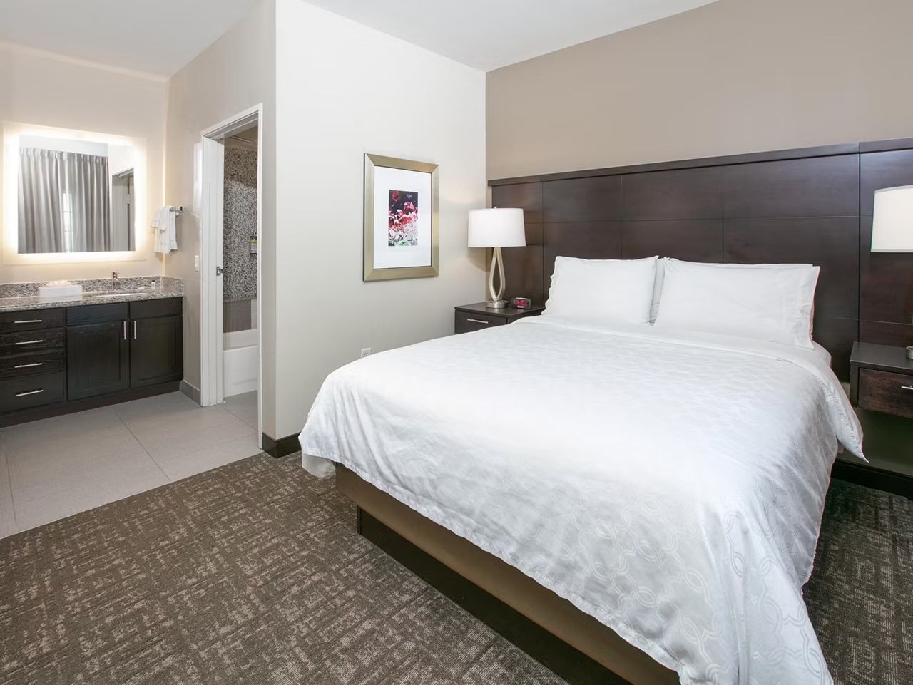 image King bed with nightstands and lamps for a restful night's sleep