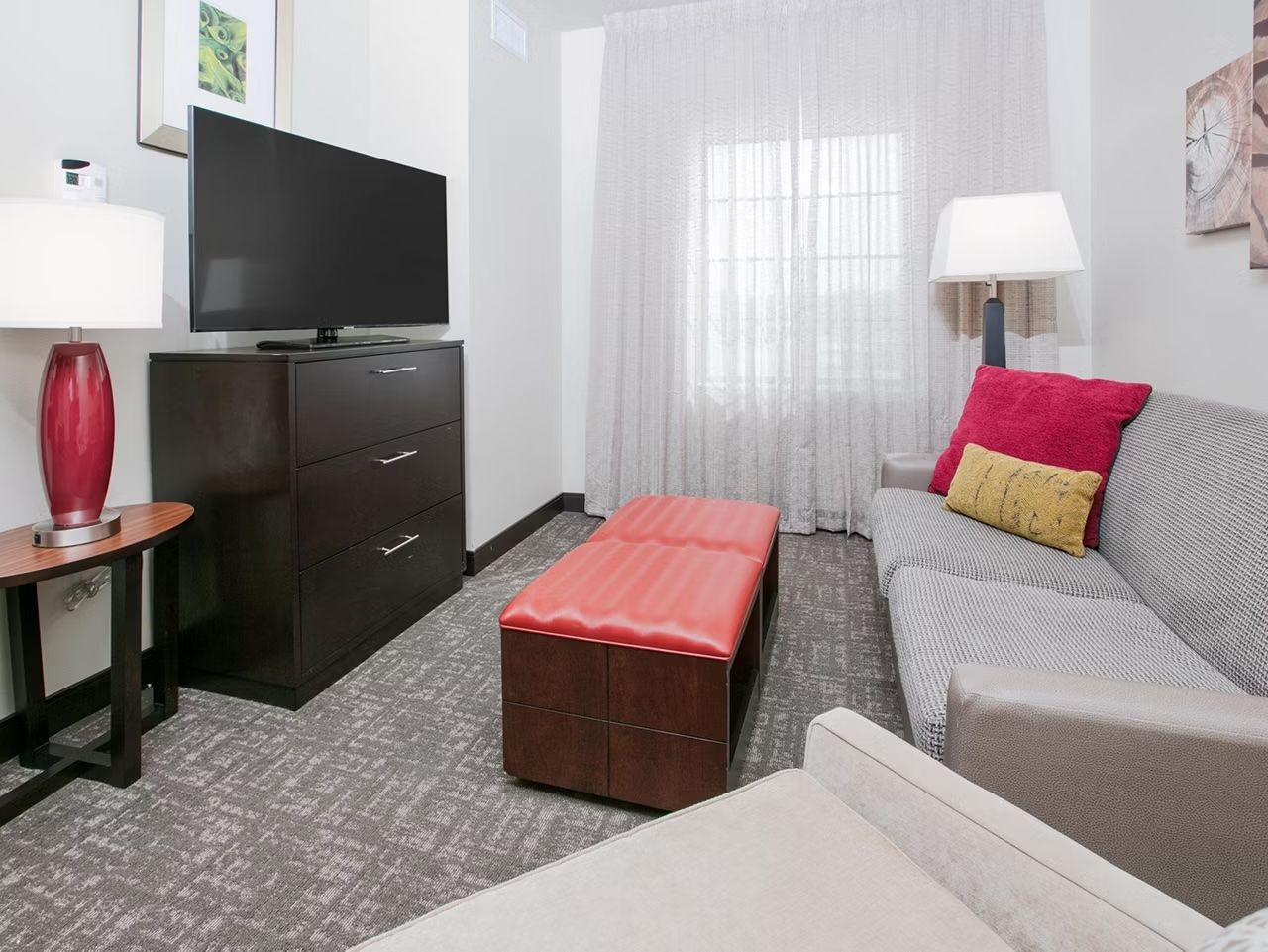 image Living area with seating and a TV for relaxing evenings