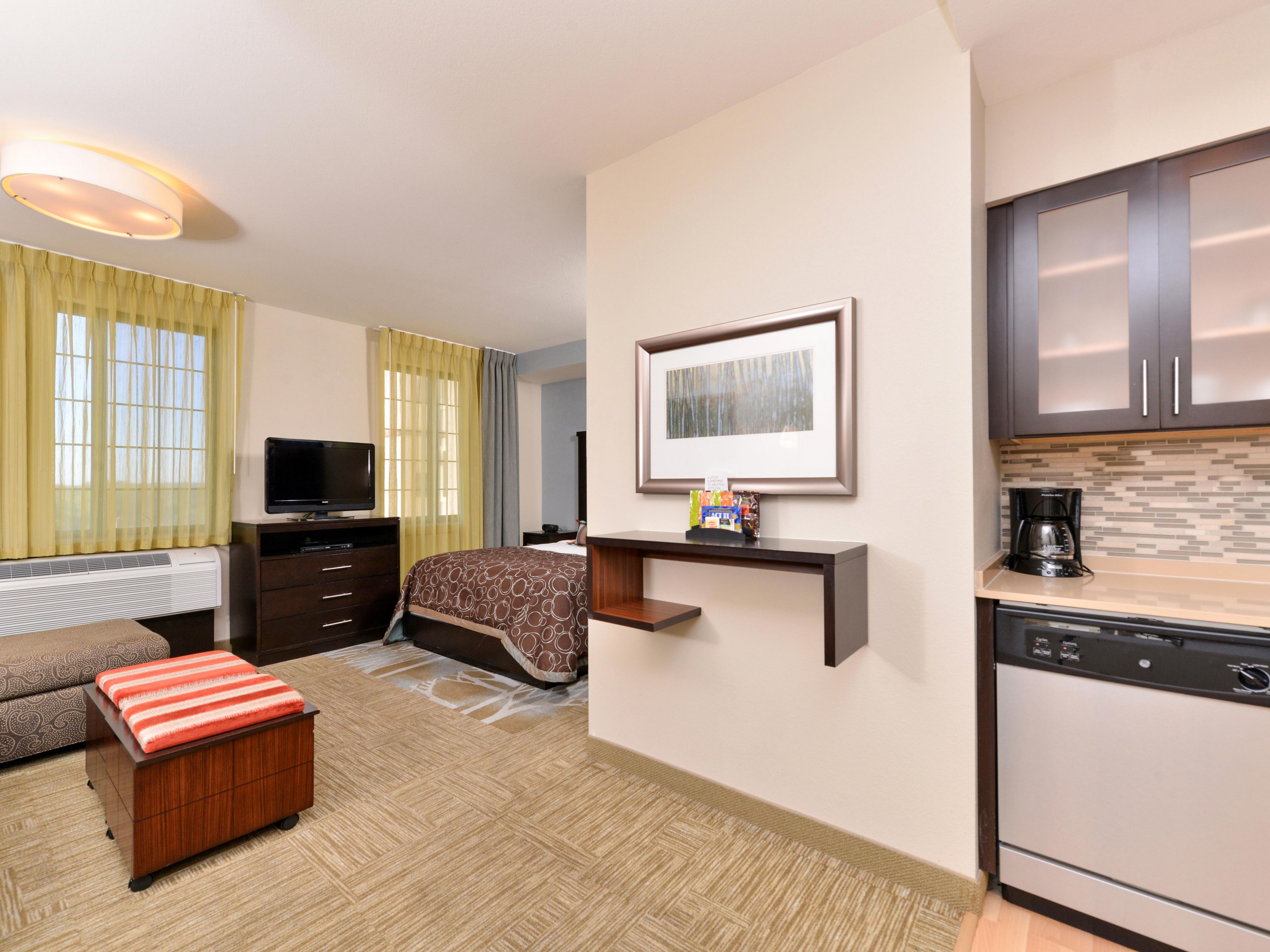 image Studio with king bed, kitchen, and seating area.