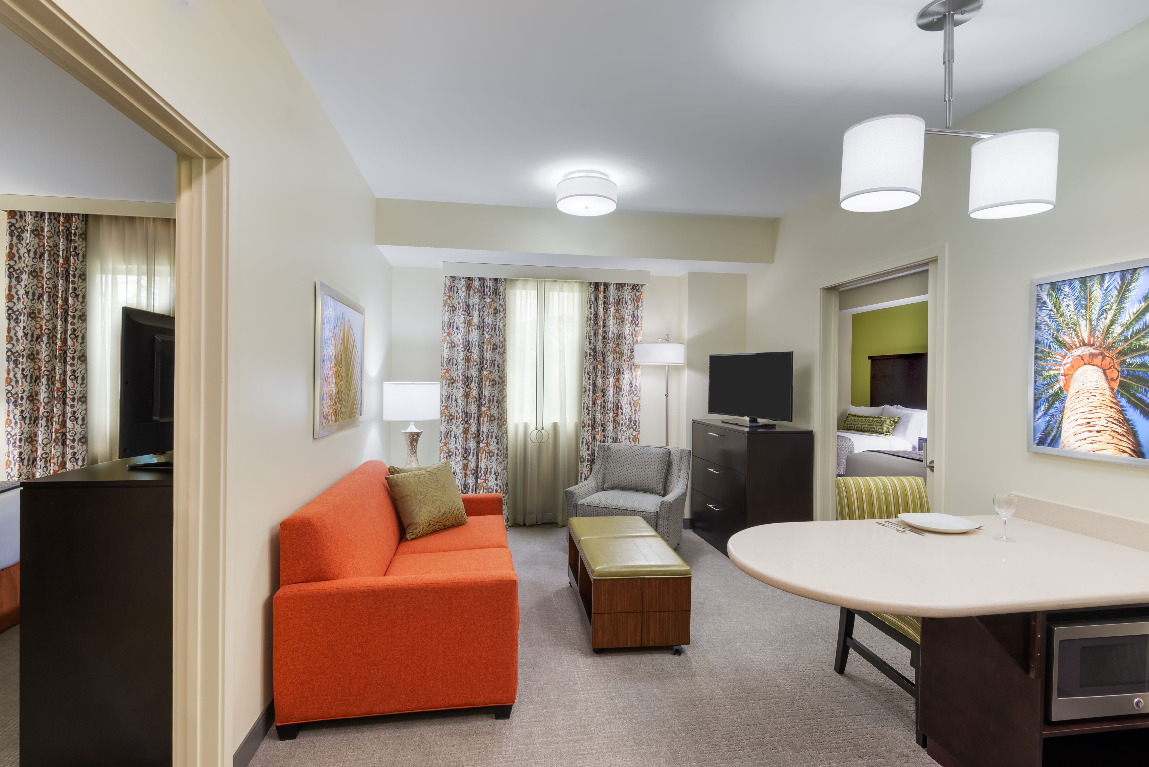 image Brighten your mornings with natural light pouring into this inviting living space, perfect for gathering.