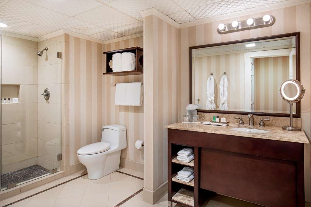 image Luxuriate in the marble bathroom, complete with plush towels and upscale toiletries.