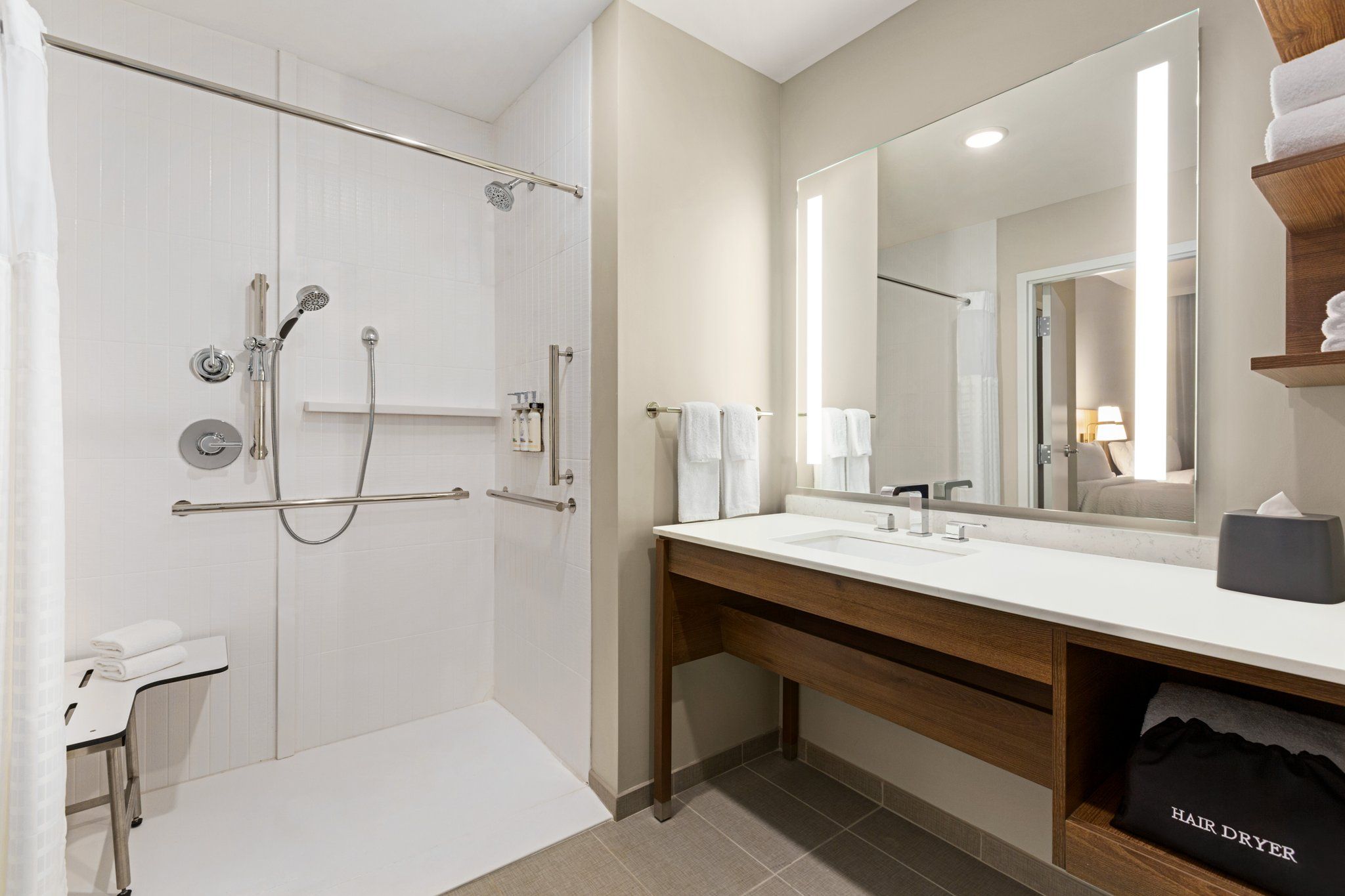 image ADA-compliant roll-in shower with a convenient layout.