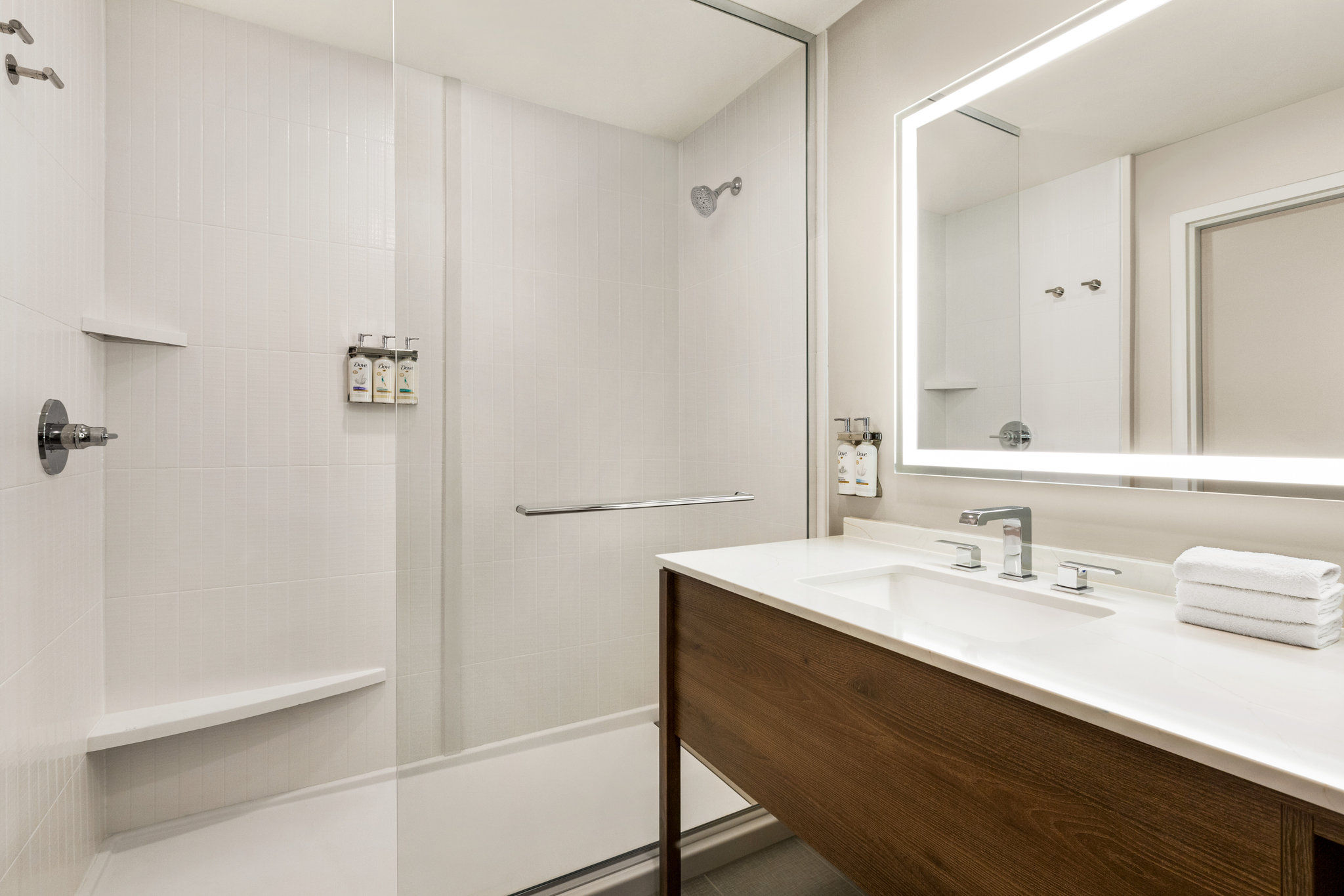 image Walk-in shower offers lots of space and a beautiful aesthetic.