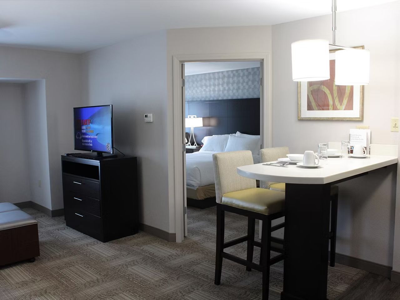 image Gather in the open living space, where comfortable seating meets modern amenities.