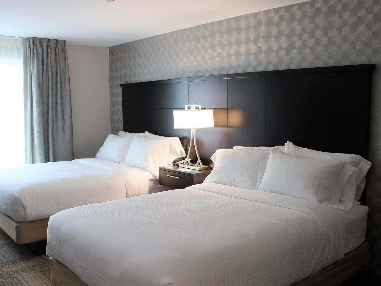 image Rest easy in the second bedroom's two queen beds, comfortable for the whole group.