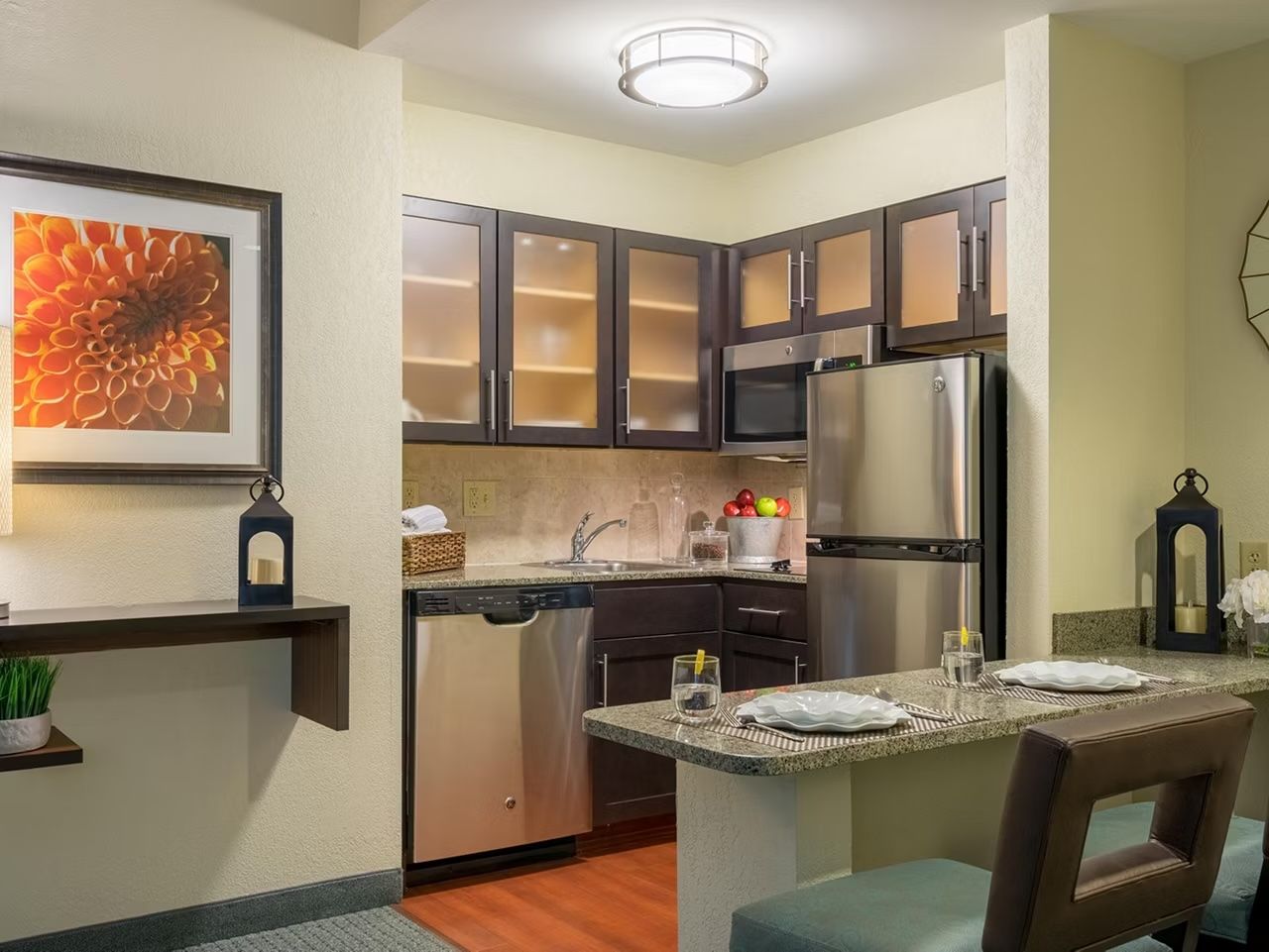 image Full kitchen with stovetop, microwave, refrigerator, dishwasher, and coffee maker — everything you need to eat in