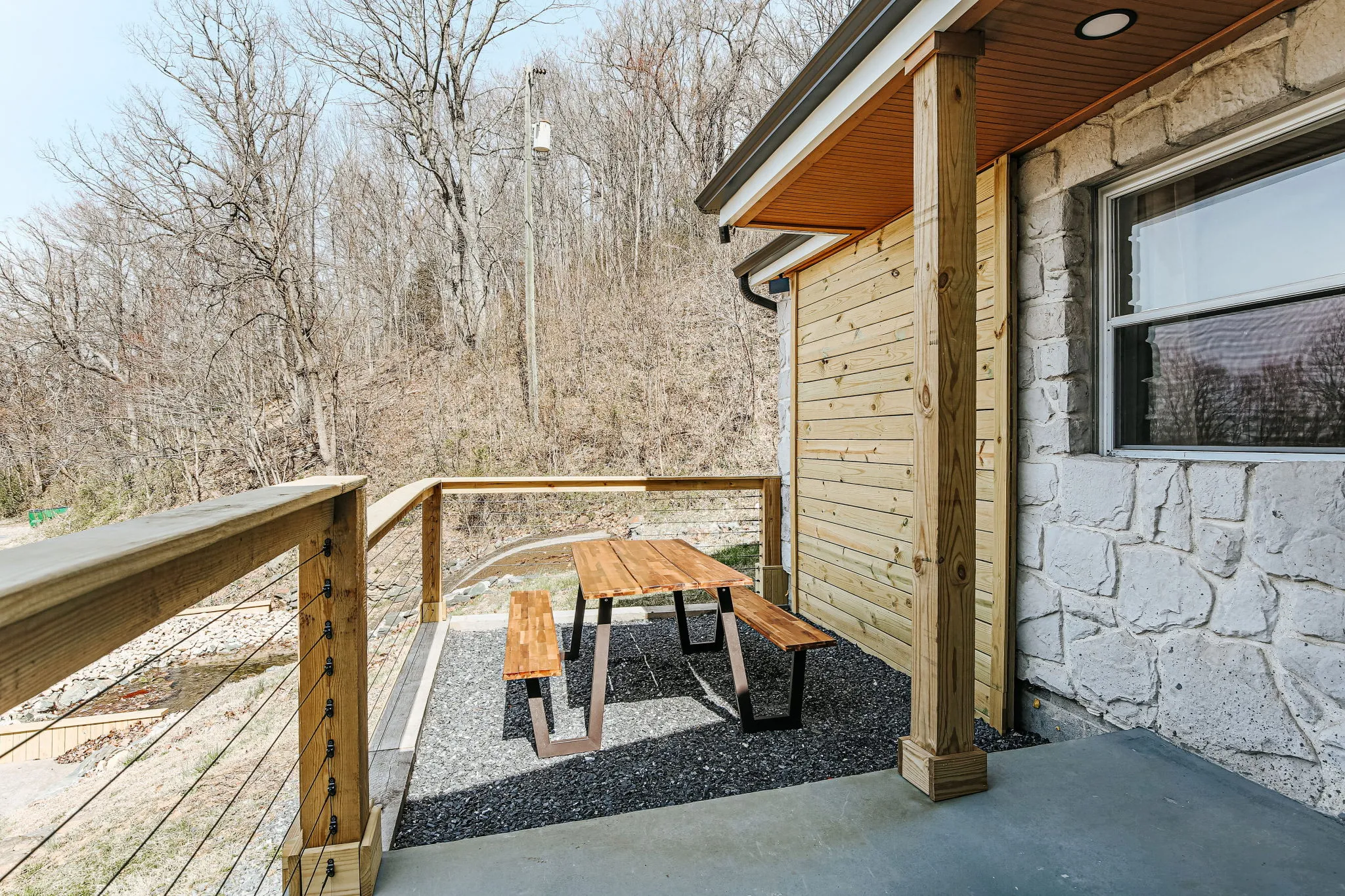 image Enjoy a moment of tranquility on the resort patio, surrounded by nature and perfect for al fresco dining.