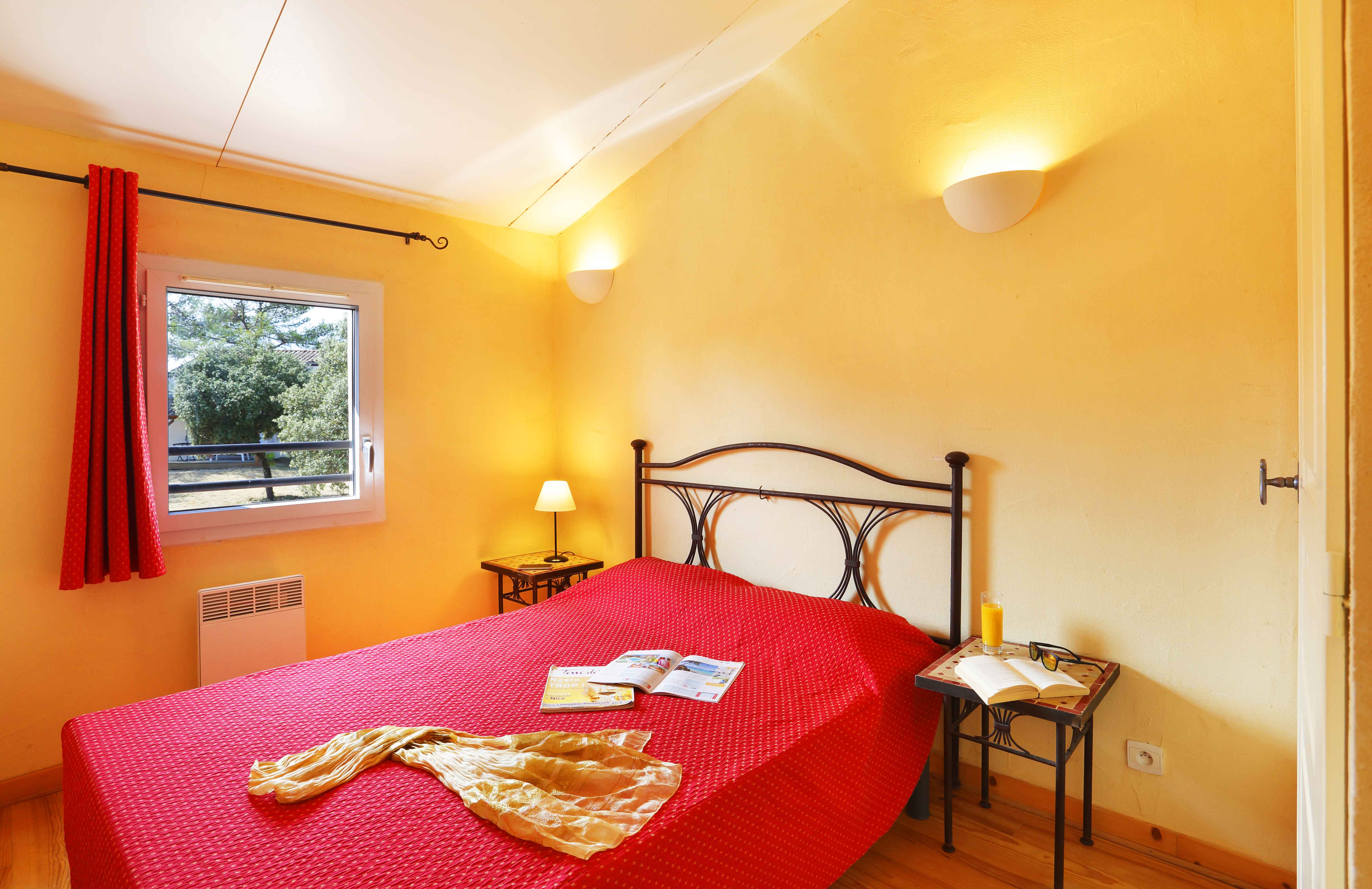 image The double bedroom is a restful haven, decorated in warm southern tones with plenty of natural light.