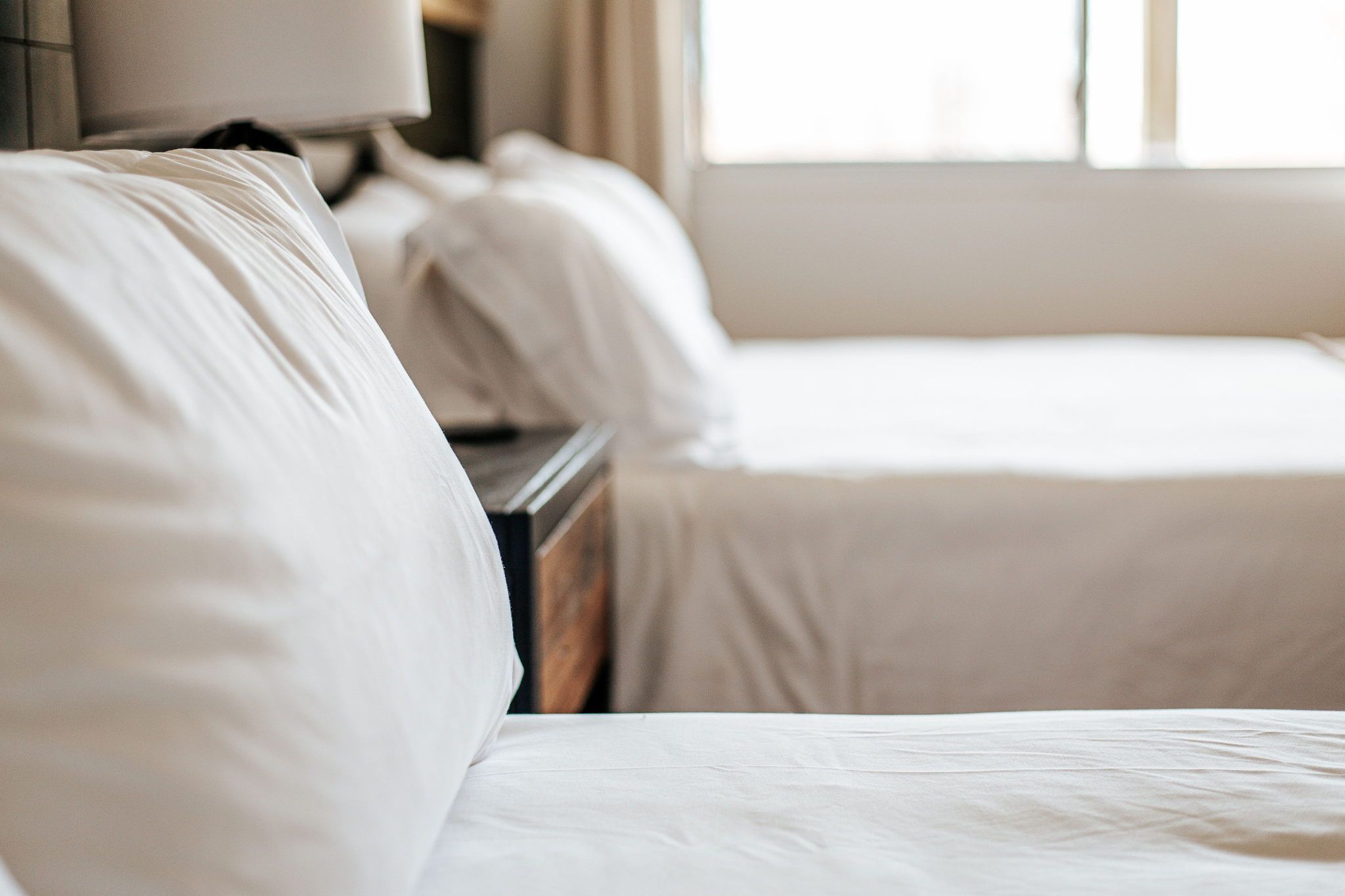 image Soft pillows await you, inviting relaxation and restful nights.