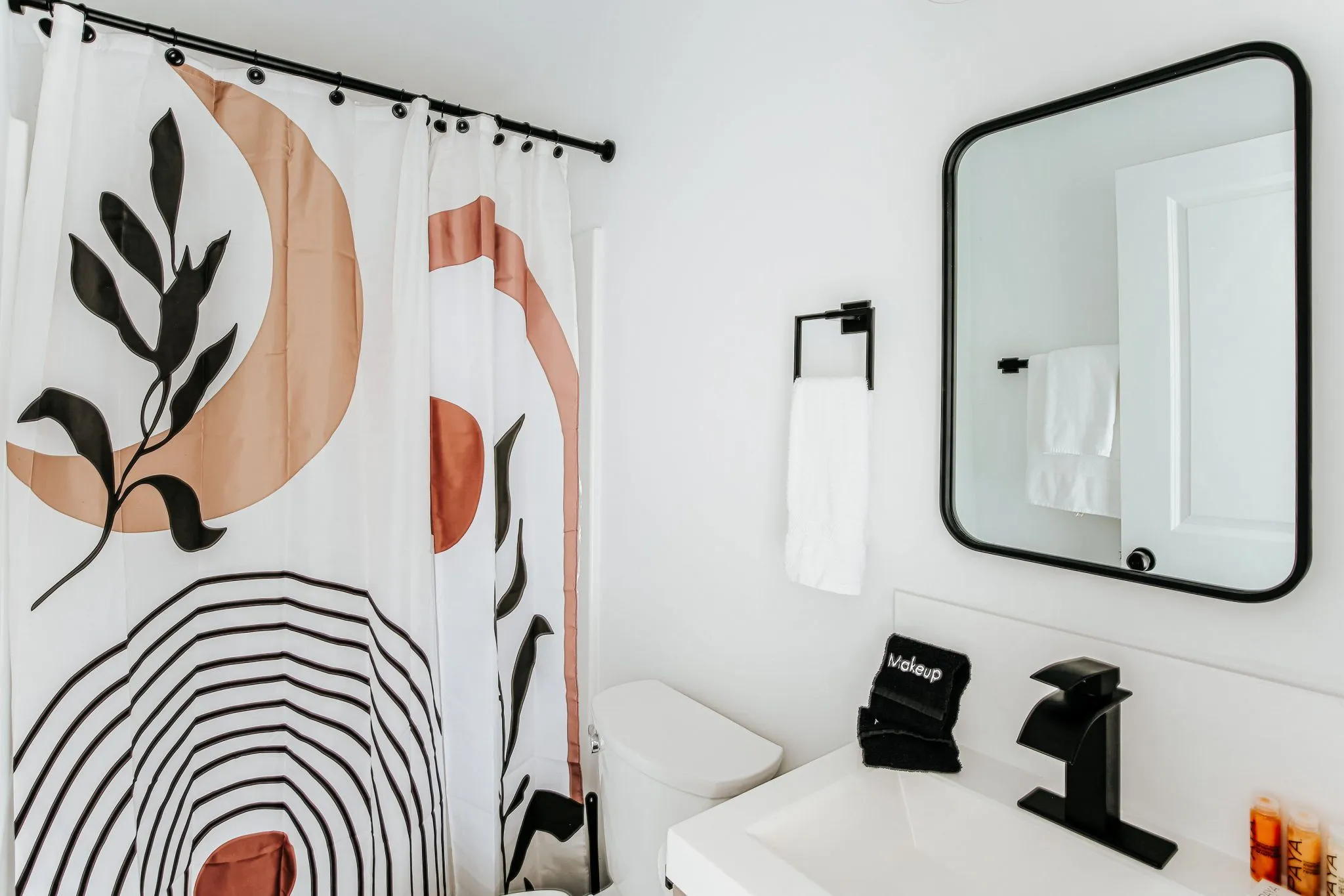 image Bright and inviting bath space equipped with modern fixtures and vibrant decor.
