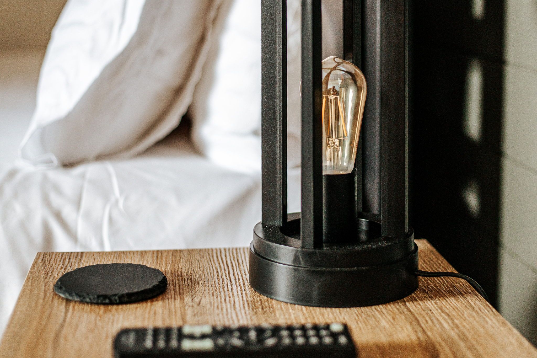 image Illuminate your evening with this stylish bedside lamp, perfect for unwinding after a day of adventure.