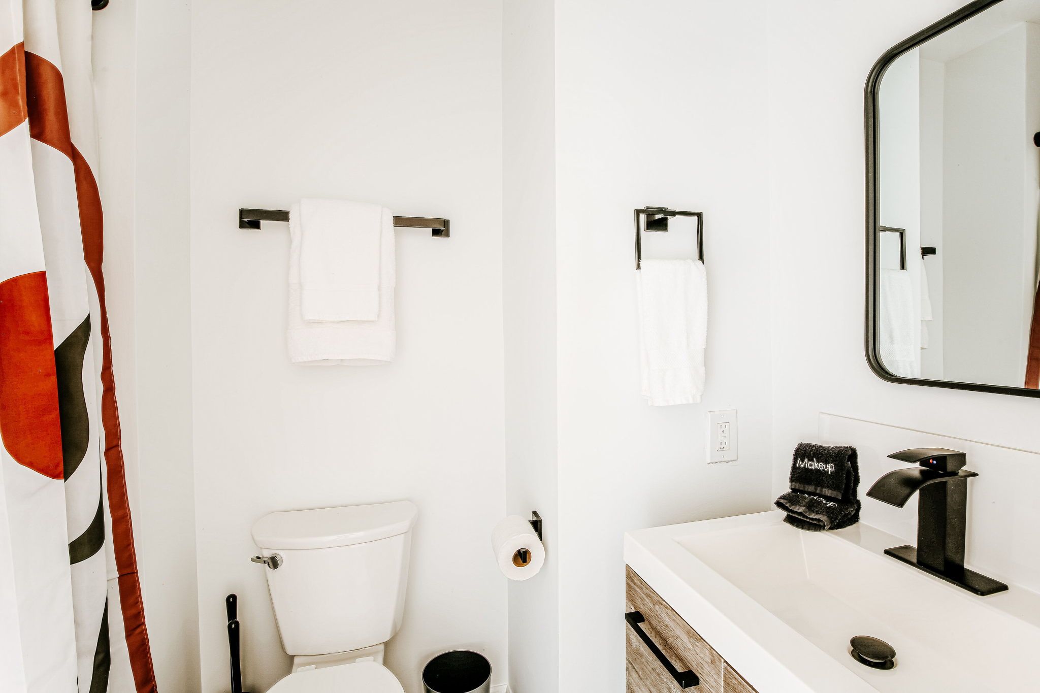 image Enjoy a fresh, modern bathroom space designed for relaxation, featuring sleek finishes and ample light.