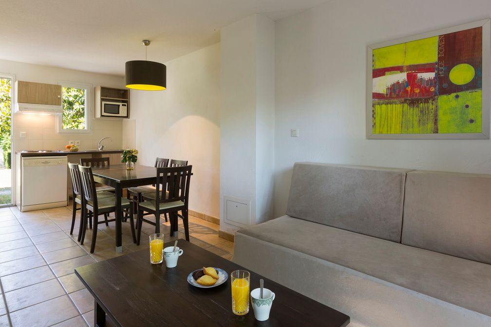 image With a fully equipped kitchen and dining table for four, families can enjoy home-cooked meals whenever the So'Inclusive buffet isn't calling.