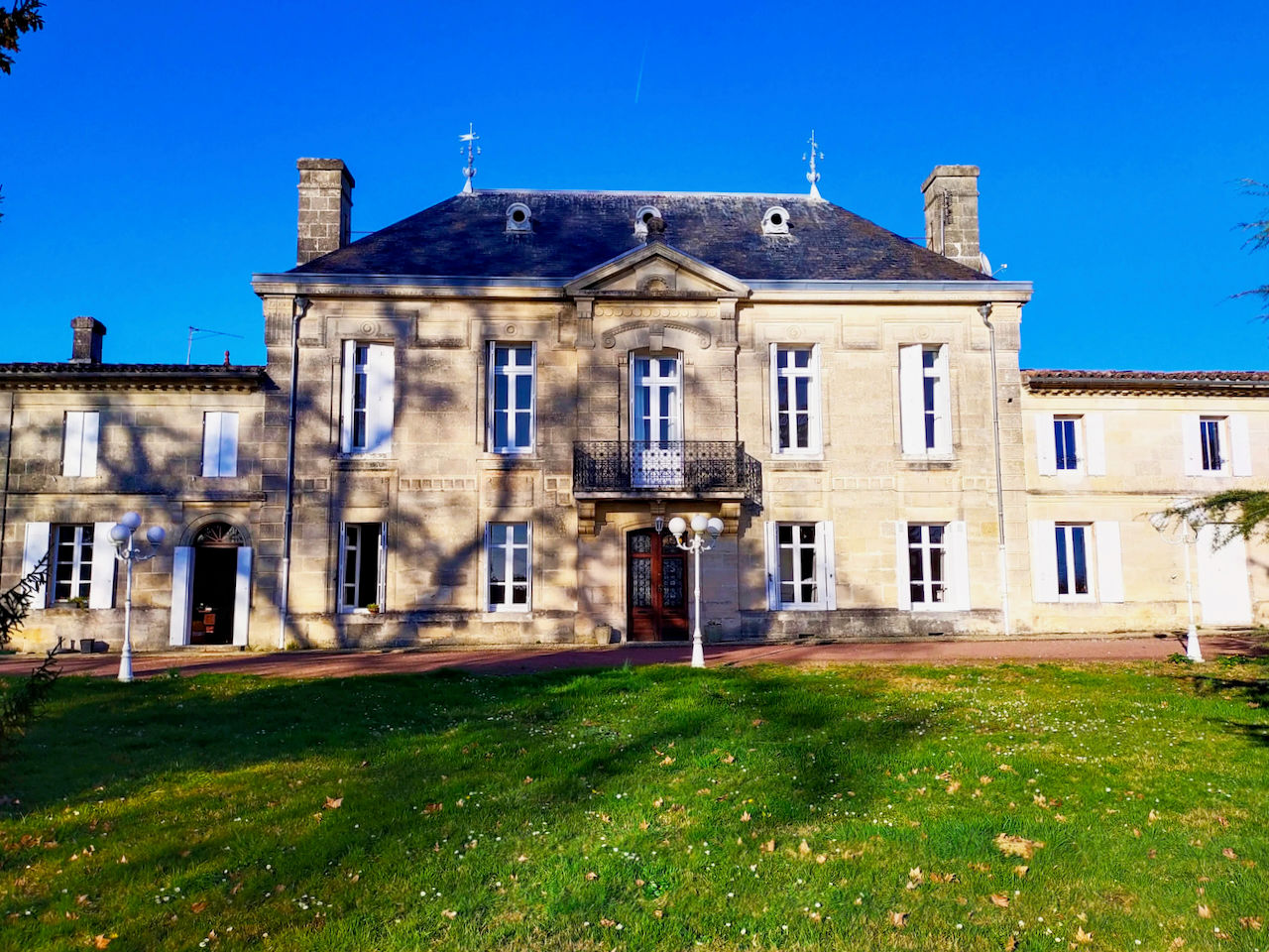 image The château's limestone facade, typical of the Bordeaux region, sits on its 18-hectare estate in the Côtes de Bourg appellation.