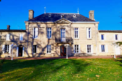 The château's limestone facade, typical of the Bordeaux region, sits on its 18-hectare estate in the Côtes de Bourg appellation.