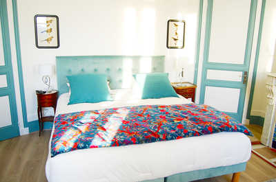 Each bedroom has its own character, with period details including ornate fireplaces alongside modern comforts.