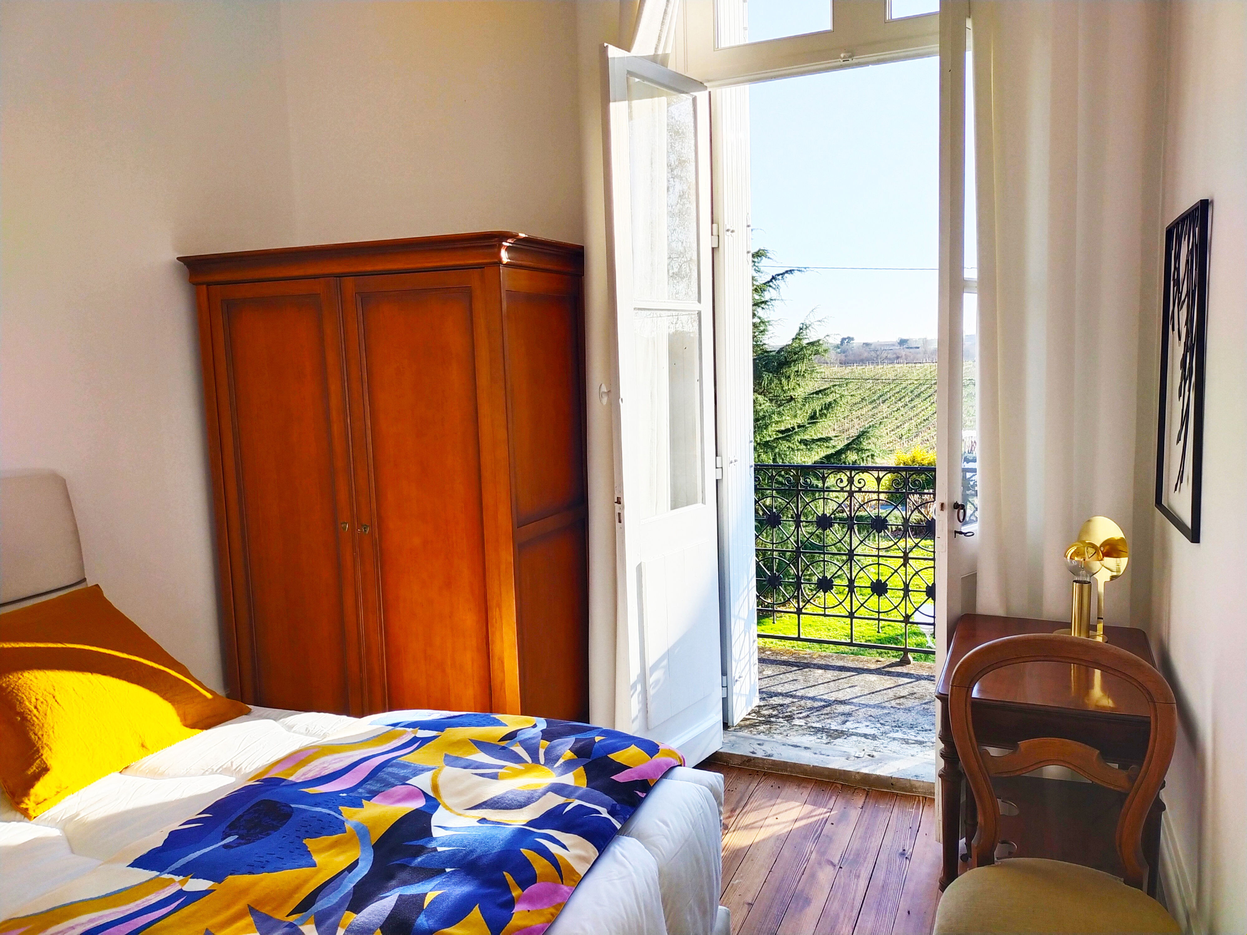 image One of four decorated bedrooms, with direct balcony access and views over the vineyards and surrounding countryside.