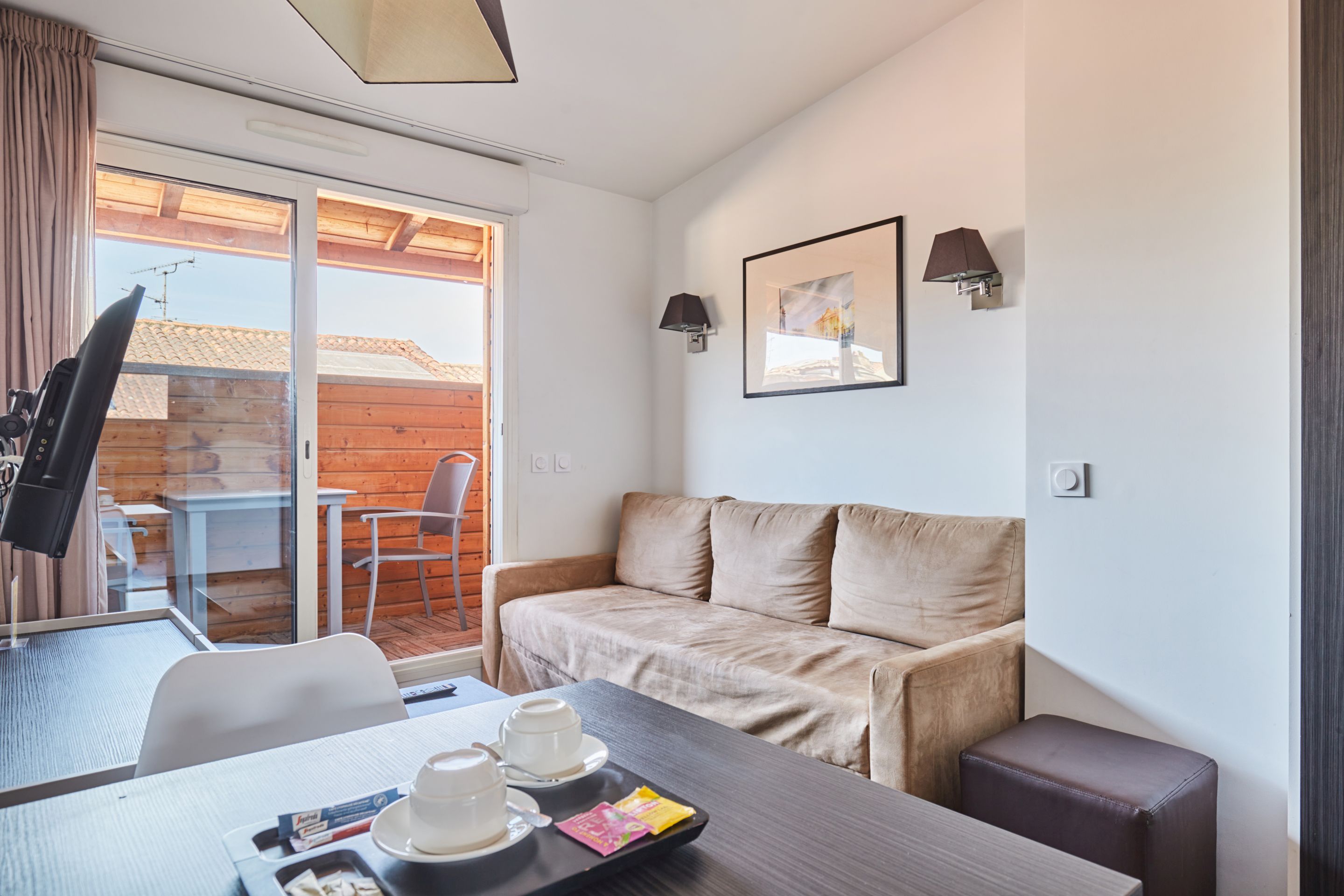 image The studio is light and well laid out, with a double bed and warm tones that make it easy to settle in after a day exploring Toulouse.