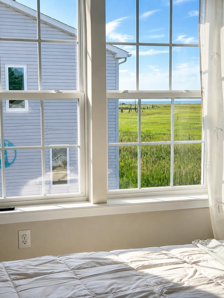 image Gaze out the window at the tranquil greenery, soaking in the peaceful atmosphere.