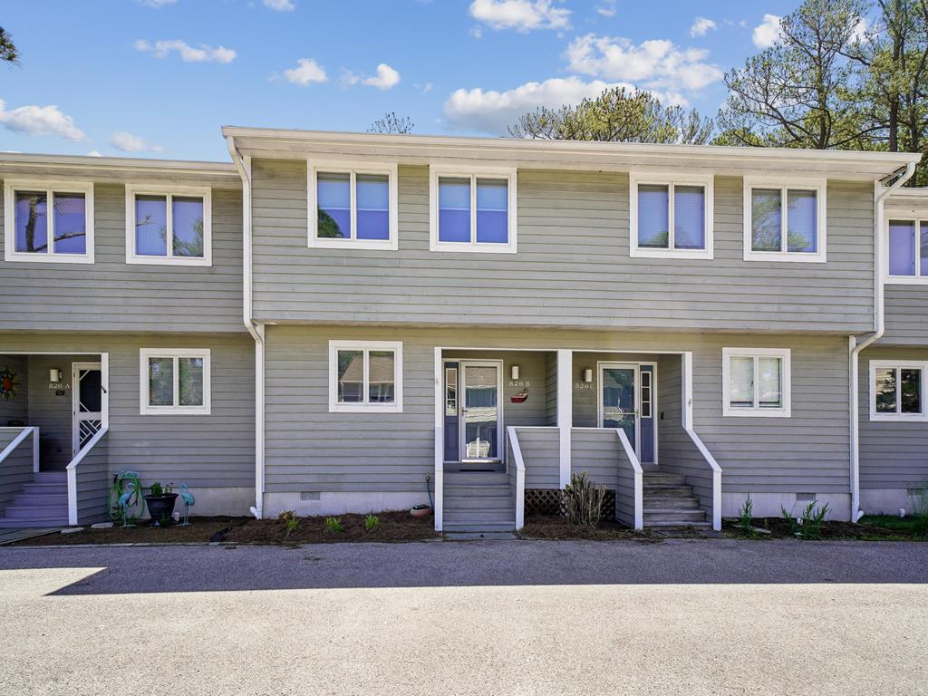 image Light gray townhome exterior with front steps -- your Bethany Beach home base for the week
