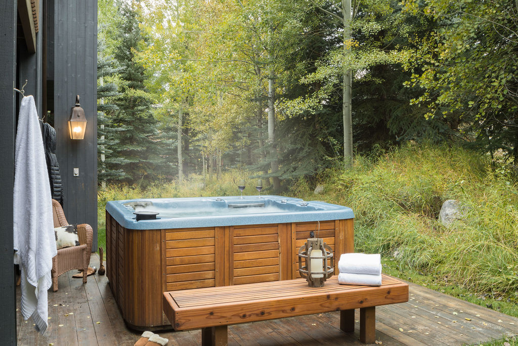 image Soak in the bubbling hot tub on the deck, surrounded by the sound of wind through the trees.