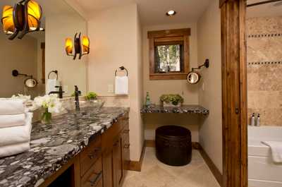 Double vanities and a separate tub room outfit one of the lodge's seven bathrooms.