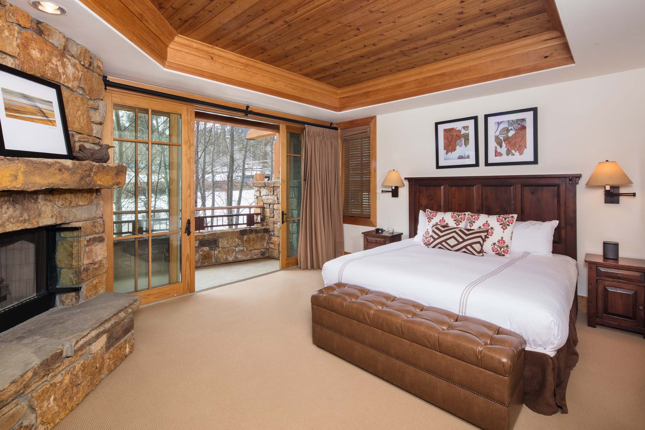 image King bed and mountain views furnish the primary bedroom.