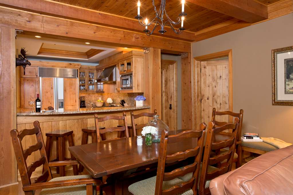 image Rustic dining area beside the open kitchen and breakfast bar.