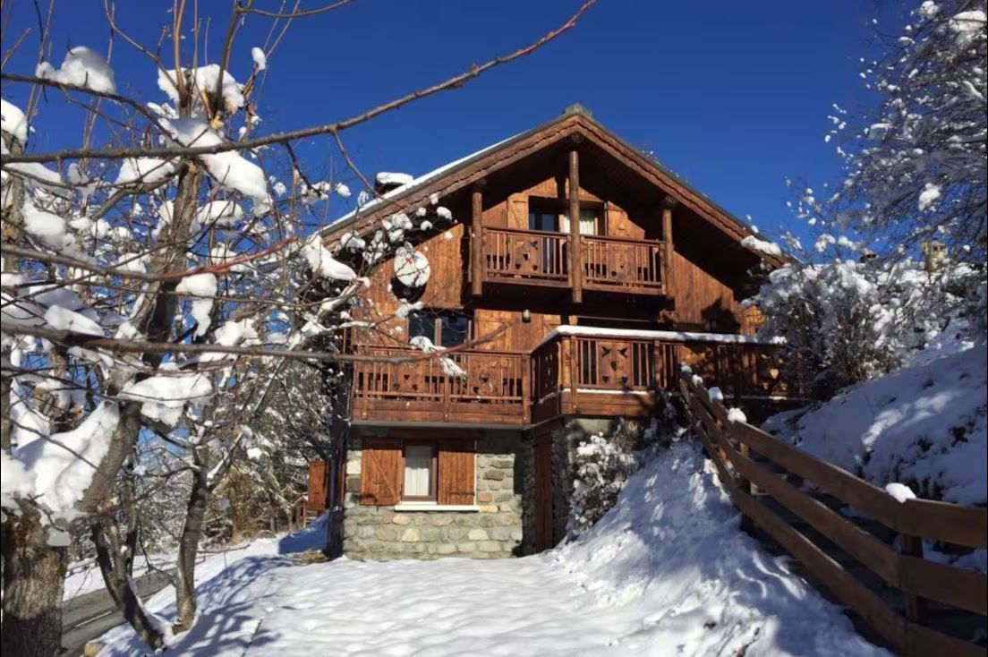 image Nestled in the snow, the wooden exterior and balconies sit just minutes from the pistes.