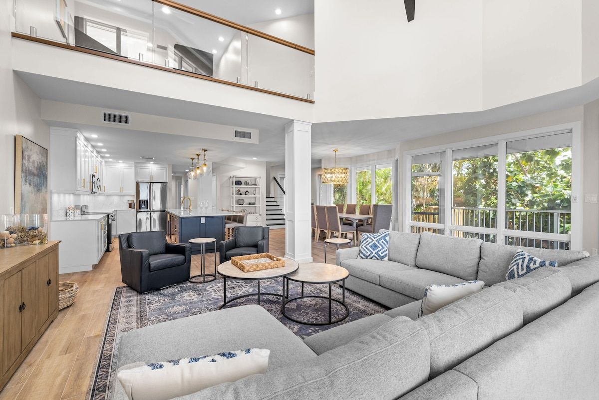 image Dining and living areas share one open space for gathering.