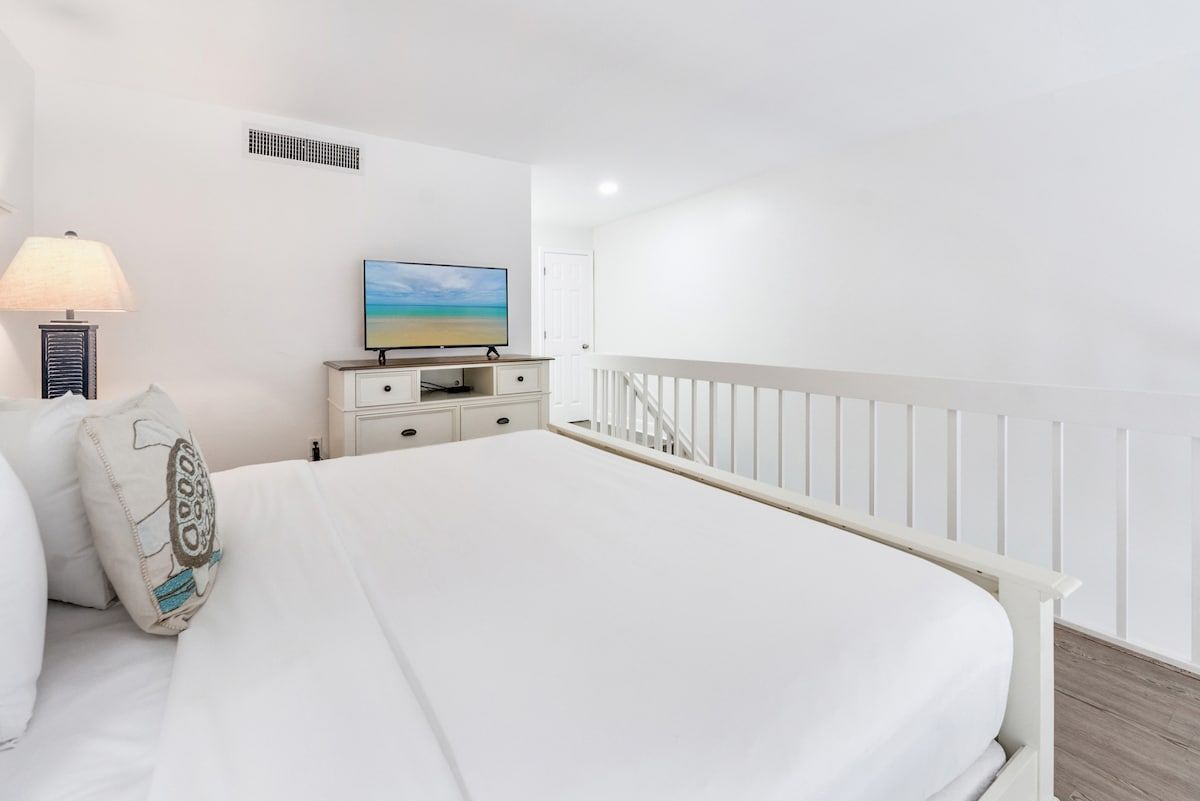 image The loft bedroom offers a quiet place to sleep upstairs.