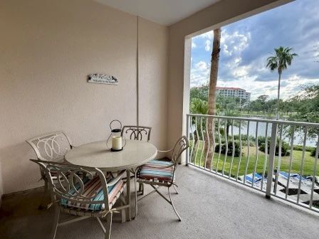 image Private balcony with table and chairs overlooking the Intracoastal Waterway — morning coffee sorted