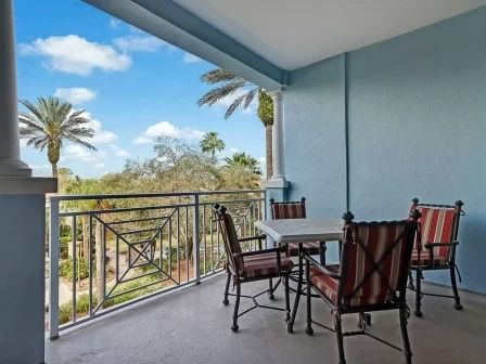 image Private balcony with table and two chairs — palm trees and Intracoastal waterway views from your seat