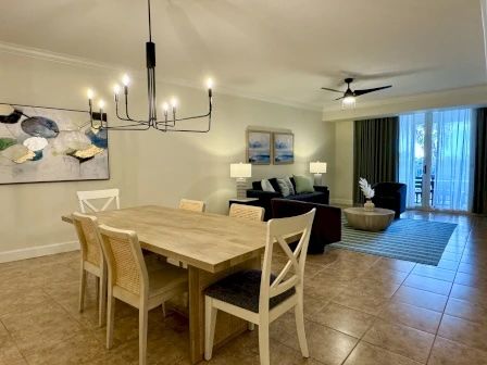 image Dining table with seating for the group in a warm, light-filled setting