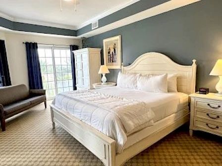 image King master bedroom with large windows for morning light and direct balcony access