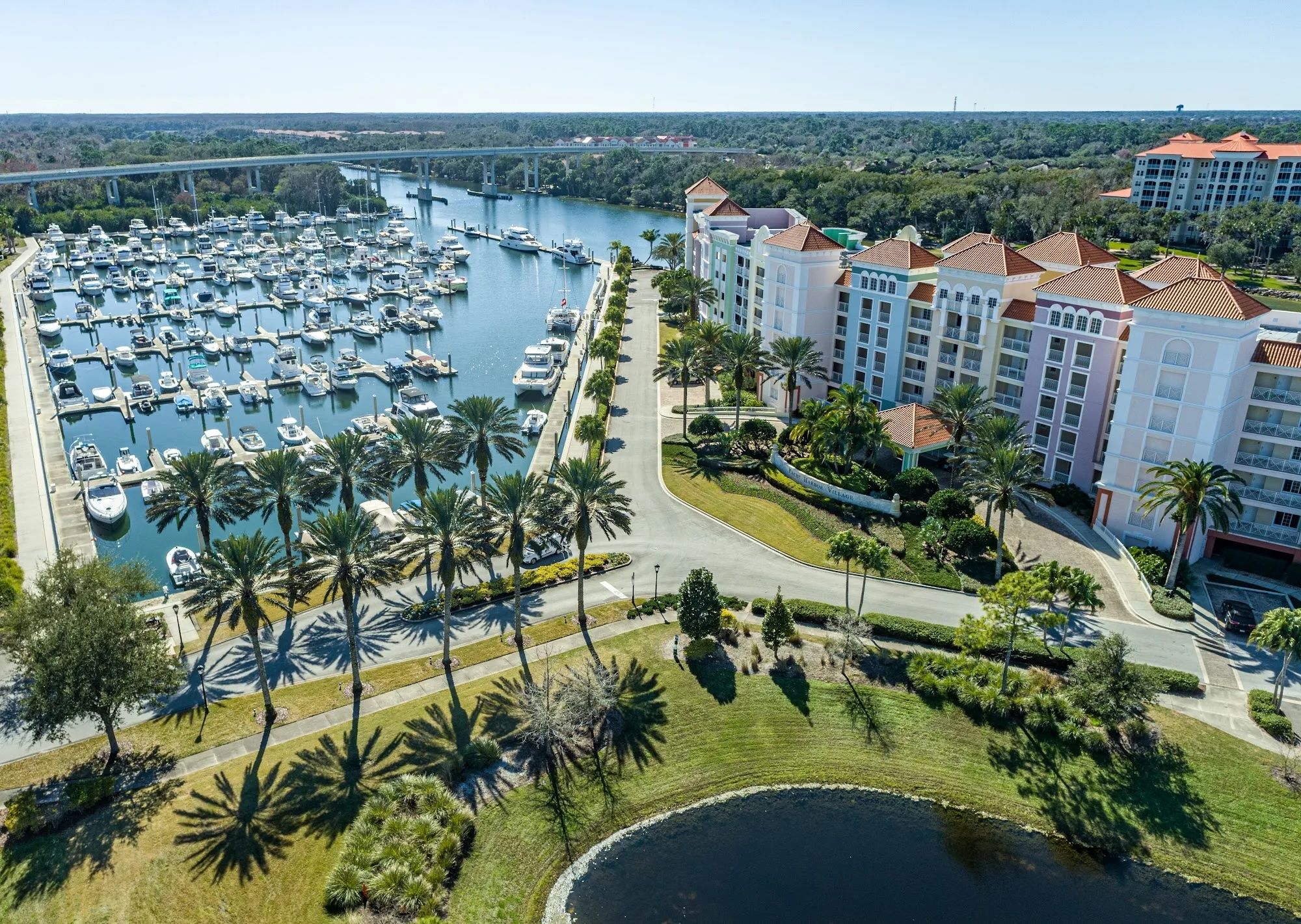 image Aerial view of the yacht harbor marina packed with boats alongside the resort