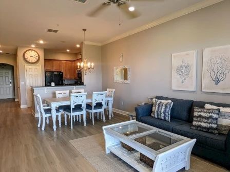 image Farmhouse-style dining table with seating for six, open to the kitchen and living area