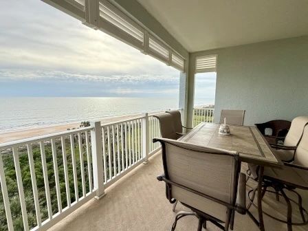 image Private balcony with outdoor seating overlooking the ocean and golf course horizon
