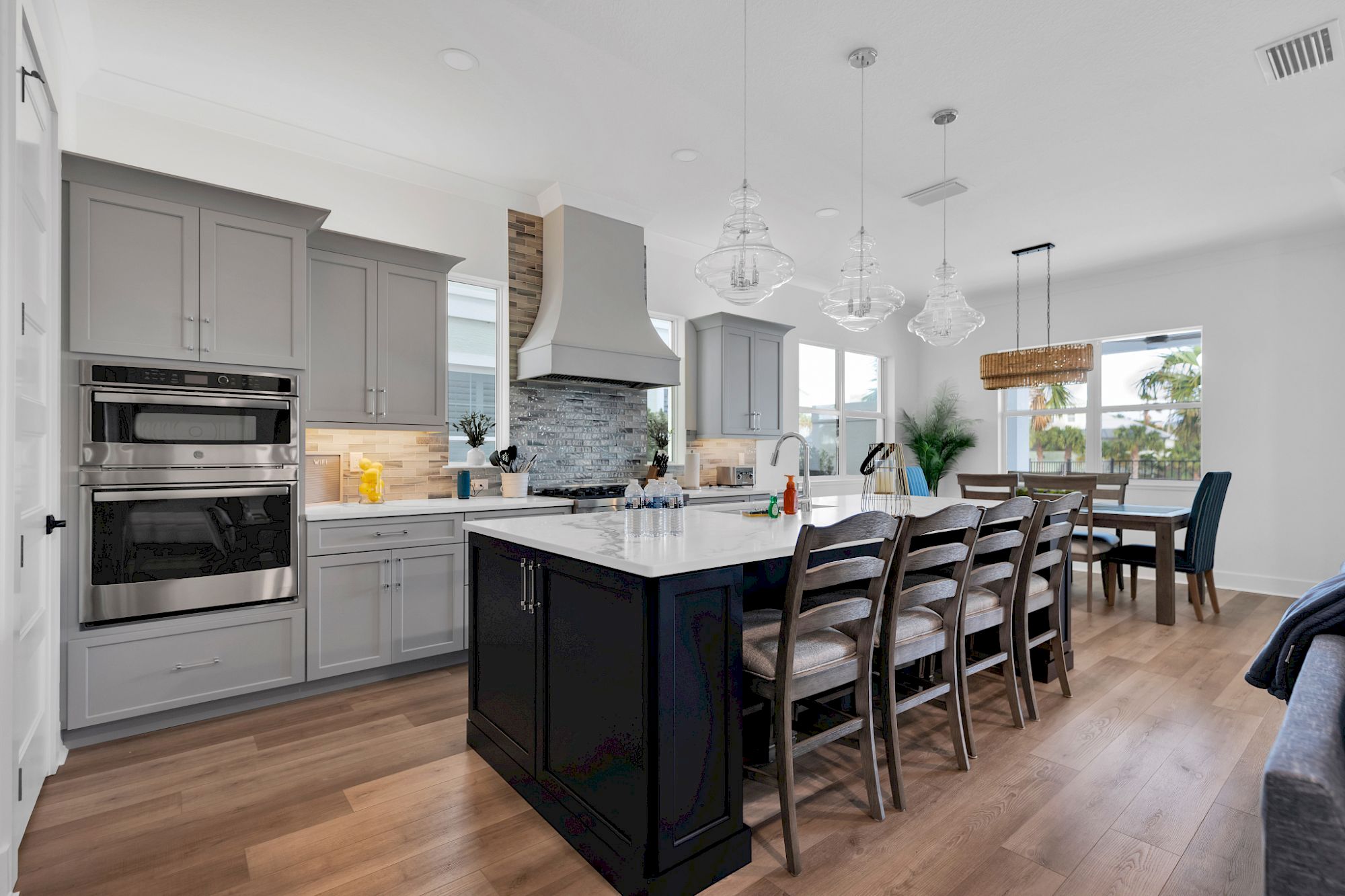 image Gourmet kitchen with full-sized appliances and a kitchen bar — room for the whole crew to cook together