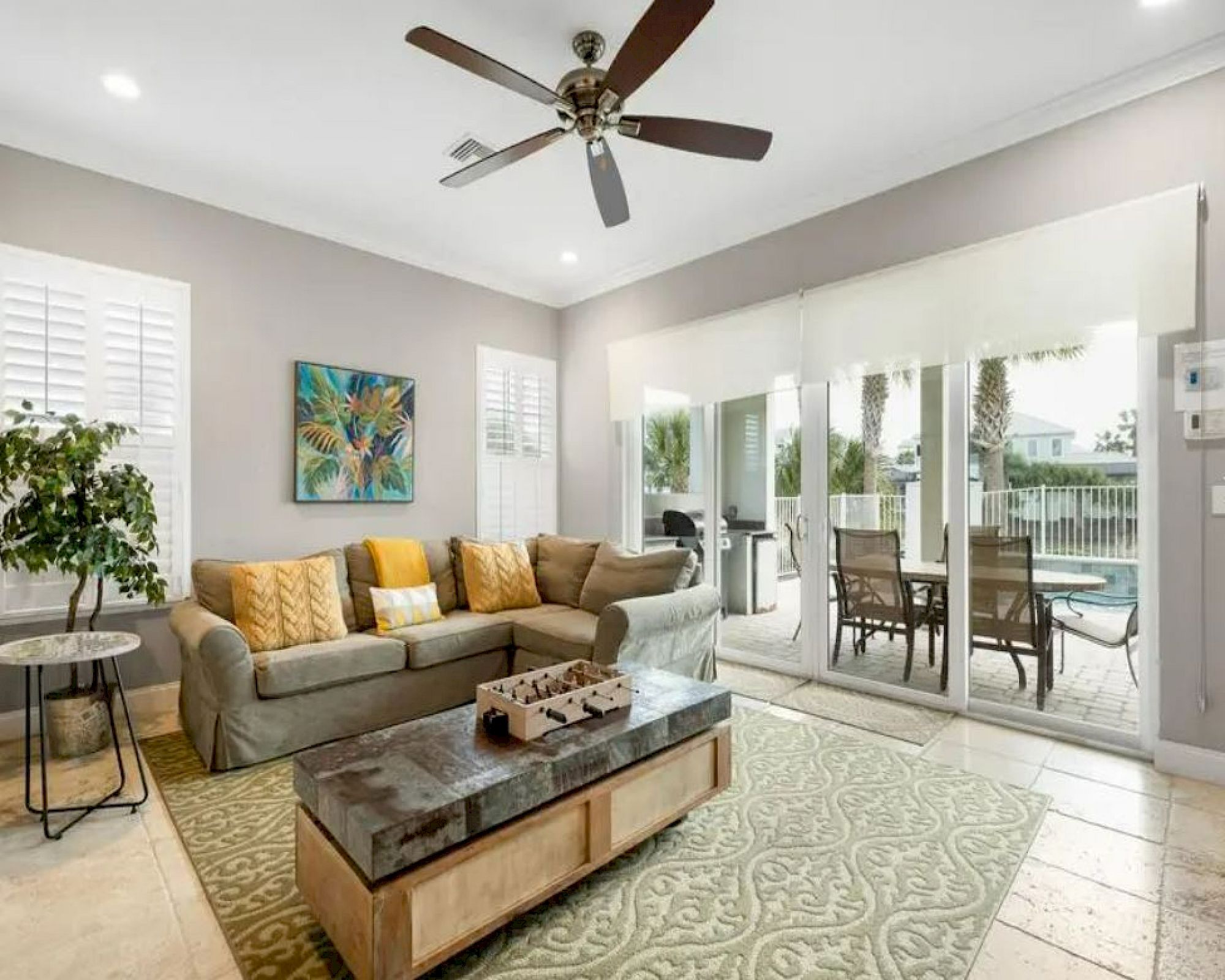 image Open living area with plush sofas and views straight out to the pool and outdoor space