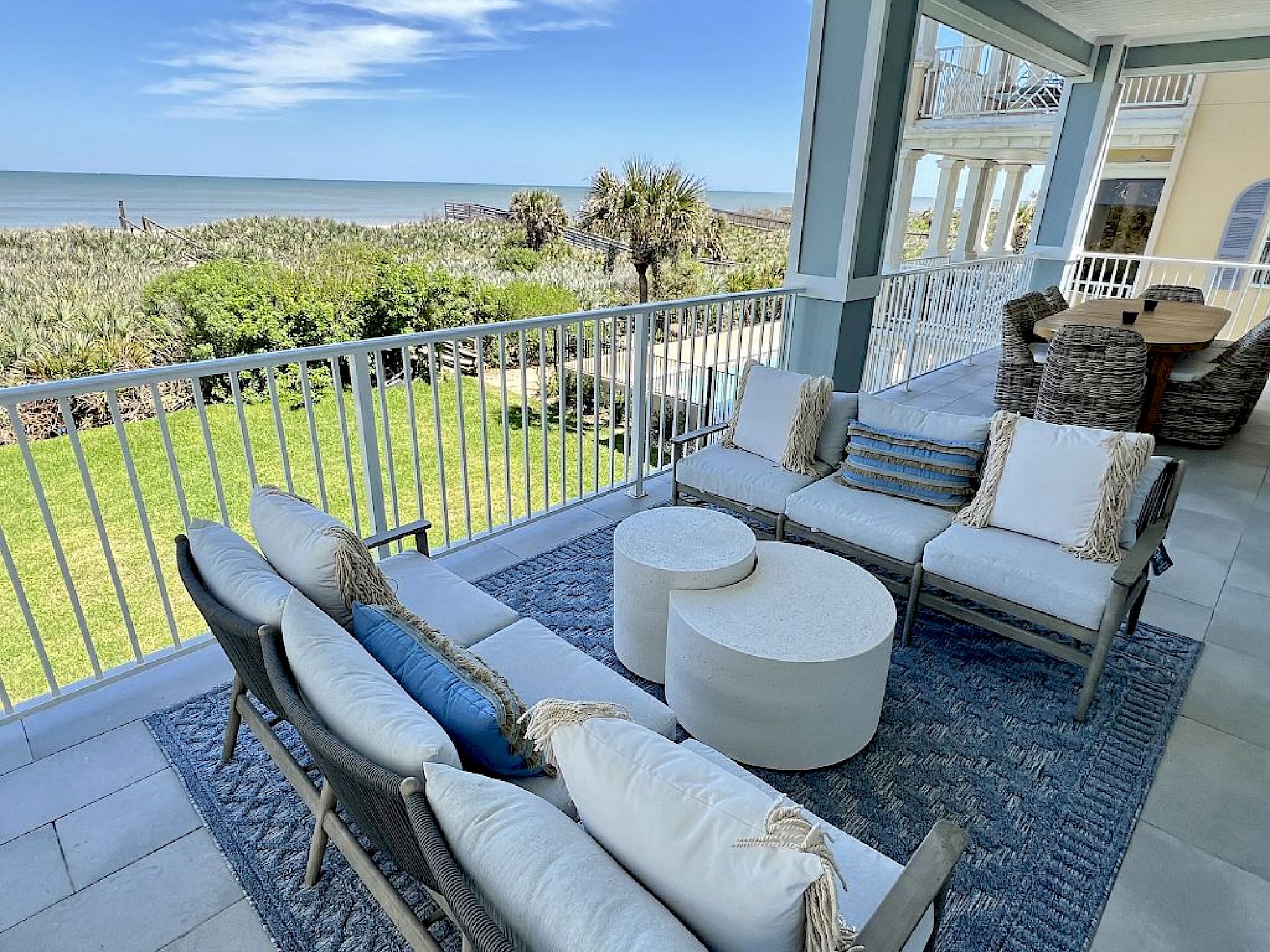 image Balcony with two chairs and a side table overlooking the Atlantic — morning coffee with ocean views